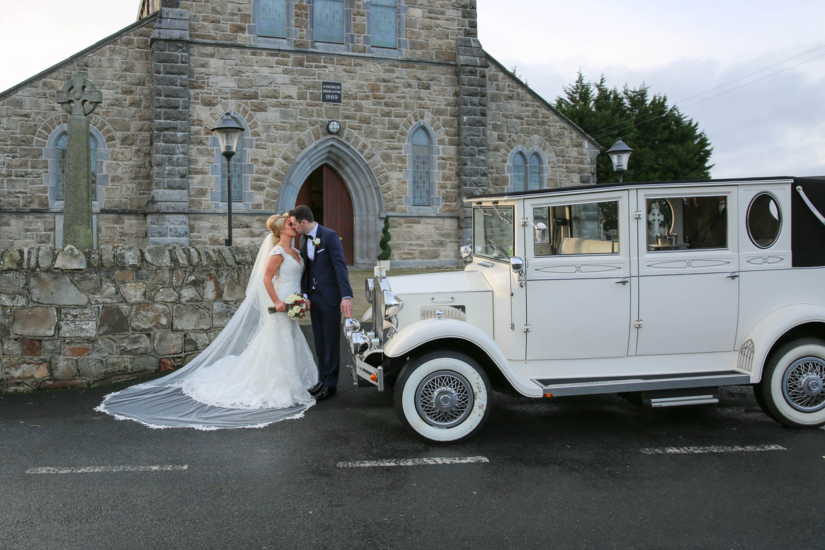 Bride and Groom with Car